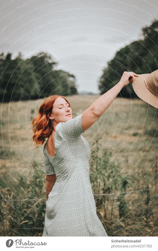 Woman dancing on meadow portrait Feminine Young woman pretty Dance Freedom fortunate Country life Red-haired Dress Exterior shot Elegant feminine eyes closed