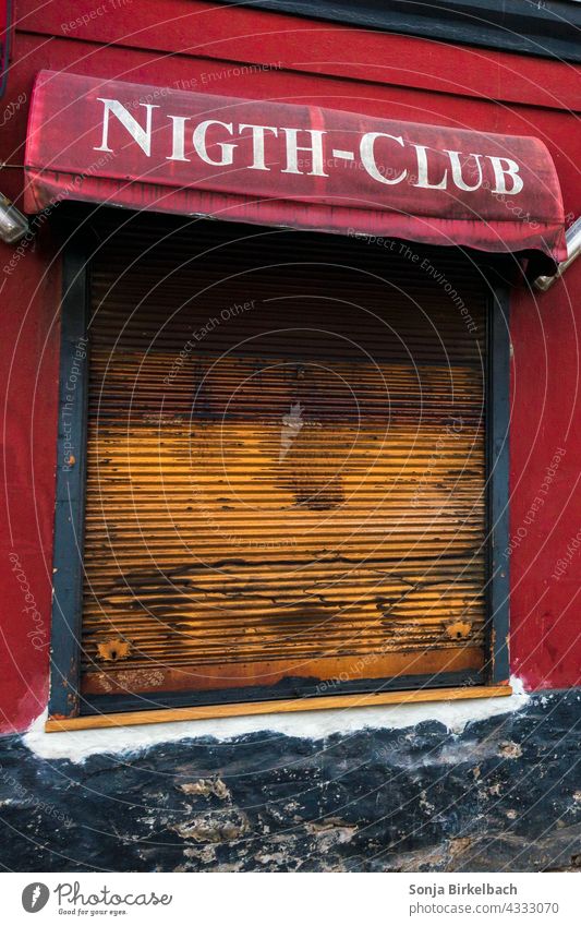 Closed nightclub - window in red wall with red awning and closed shutters, a bit run down Nightclub Club Night life Bar Alcoholic drinks Party Beverage Cocktail