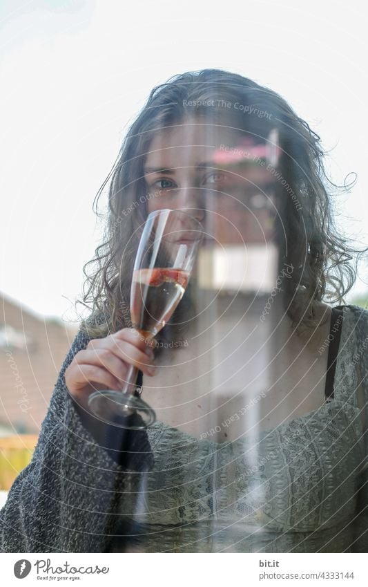 Young woman drinking champagne with fruits. teenager Sparkling wine celebrations Prosecco Drinking stop Feasts & Celebrations To hold on Alcoholic drinks Glass