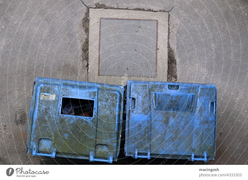 Bird's eye view of blue waste paper containers Waste paper wastepaper collection Waste paper bin waste disposal Exterior shot waste disposal companies Disposal