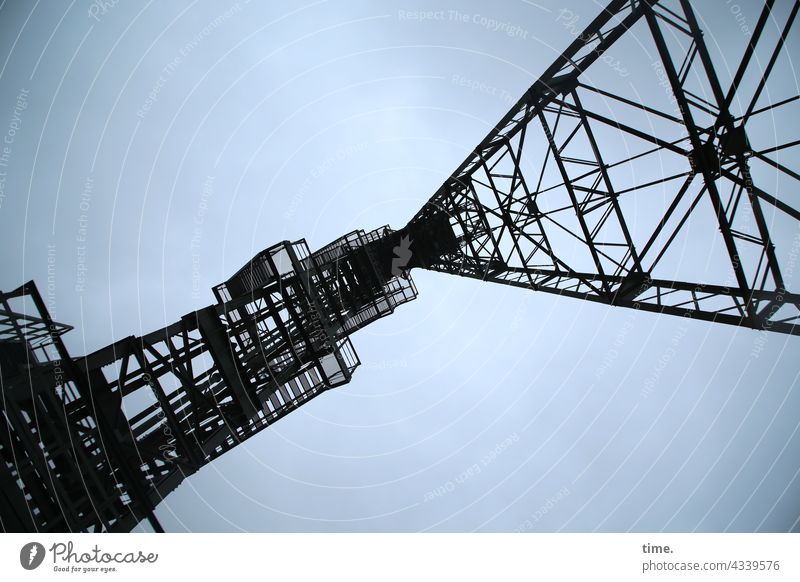 metal guru Manmade structures Architecture Industrial monument Mine tower Tower Metal Iron Tall Sky Silhouette lines functional Cable Energy industry