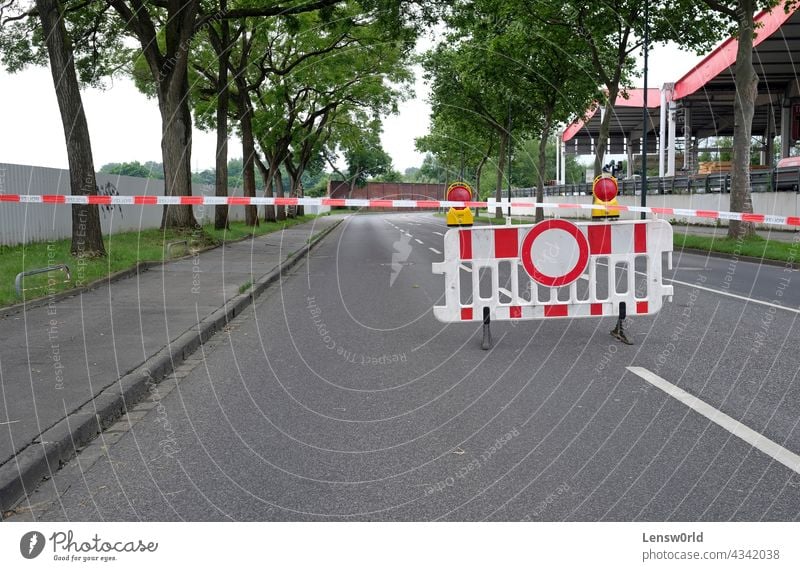 Extreme weather - closed off street following the flooding in Düsseldorf, Germany disaster do not enter düsseldorf empty nobody road road closure warning