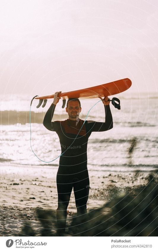 #AS# Surfer with carrying role Surfing Surfboard Surf school Surfers Paradise Fuerteventura Canary Islands Aquatics Extreme sports Ocean Waves Beach coast
