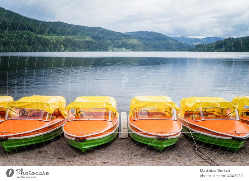 Pedal boats at the Titisee Pedalo Lake Lakeside vacation Vacation mood Vacation photo Vacation destination Black Forest Lake Titi