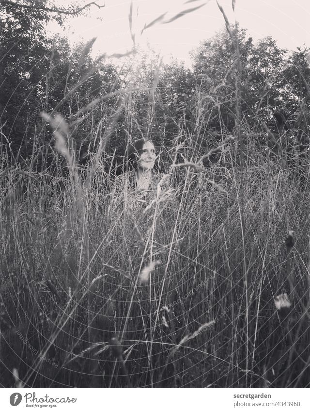 [PARKTOUR HH 2021] It's still growing. search Grass Garden Monochrome Hide Nature Woman Exterior shot Meadow Plant Summer Day Park grasses Smiling
