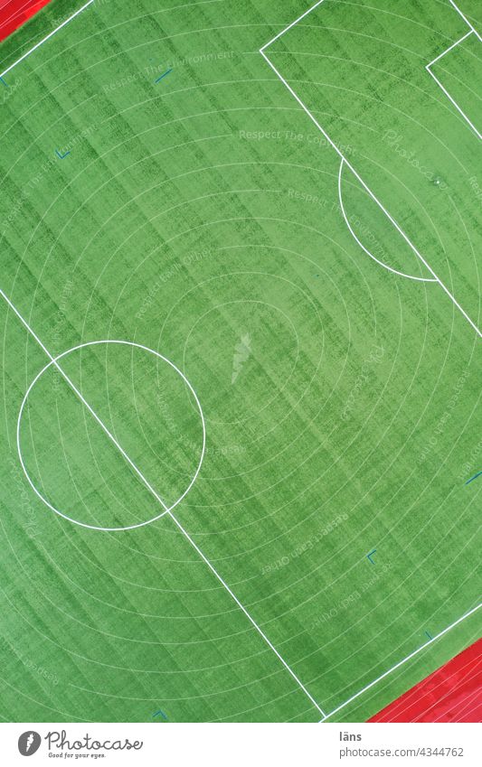 playing field Sporting grounds Green Sports. Colour photo Foot ball Artificial lawn Playing field Running track Lines and shapes from top to bottom UAV view