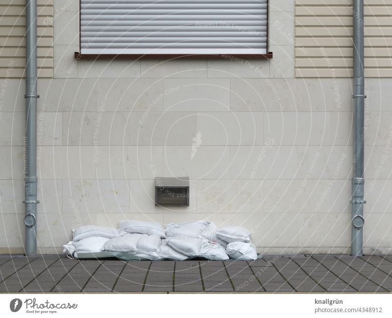 flood protection Sandbags House (Residential Structure) Deluge Downpipe Downspout New building about each other Wall (building) Wall (barrier) Colour photo