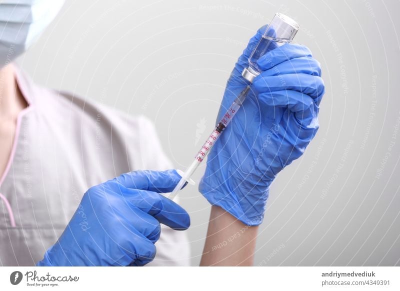 Medical hand gloves dispose medication drug needle syringe drug,concept flu shot vaccine vial dose hypodermic injection treatment disease in hospital,prevention immunization children