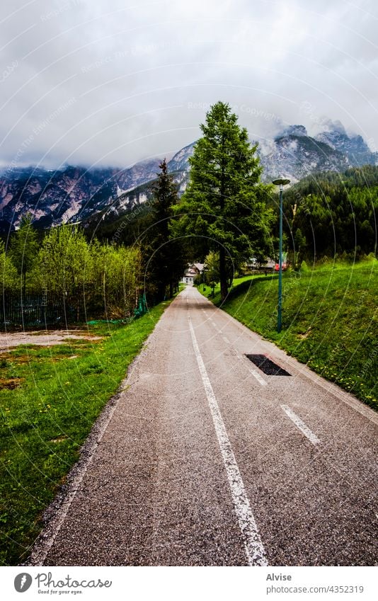 2021 05 15 Cortina bicycle lane summer travel path italy mountain alps nature outdoor cycling peak dolomite scenery landscape beautiful forest alpine trail