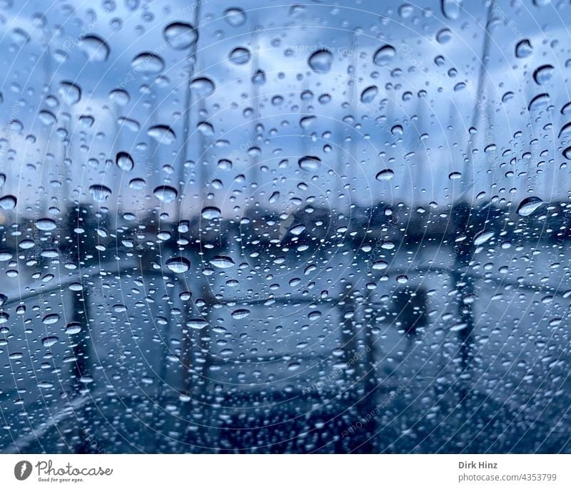 View from a yacht in the rain raindrops Rain Window Yachting Weather Stern Rear Window Drops of water Aquatics Bad weather downpour Wet Water Detail Close-up