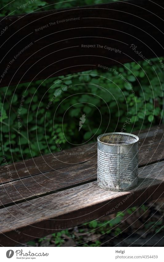 Smoker's corner - a tin can stands as an ashtray on a wooden bench in the park smoking corner Tin Bench Wooden bench Seating Tree seat Smoking Addiction Ashtray