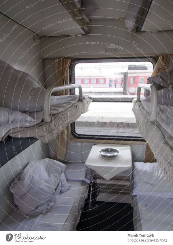 Sleeping car compartment with six beds in a Chinese train. Train travel Passenger train China Railroad car Arrival Morning Train window sleeper