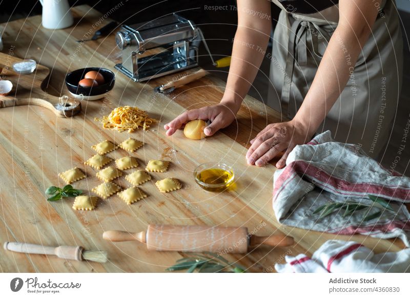 Anonymous Person Preparing Homemade Raviolis food cooking healthy table traditional wooden nutrition closeup pasta board chef cooked cuisine culinary culture