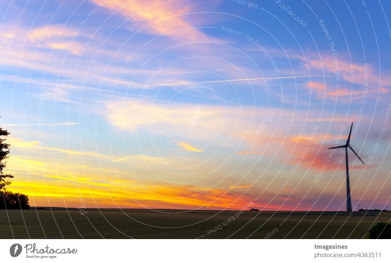 Sunset sky with contrails. Evening sky at sunset. Dramatic blue and orange clouds at dusk. Abstract weather concept Atmosphere Autumn Bright Calm Cirrostratus
