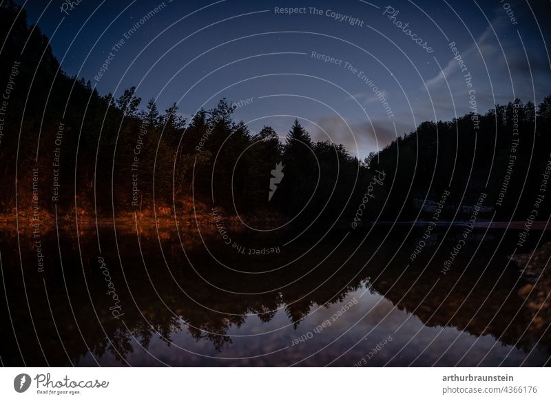 Night shot of calm water under starry sky in forest Nature Exterior shot Deserted Landscape Lake Water stars Starry sky Starlit Night sky Long exposure