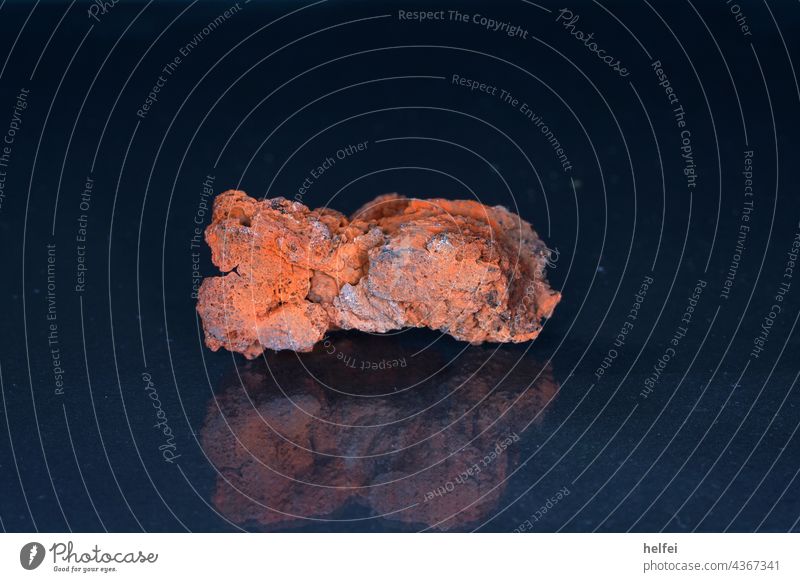 Lava stone with quartz inclusions on reflective background photographed in studio Stone Volcano Eruption Rock Nature naturally Geology Volcanic Mountain