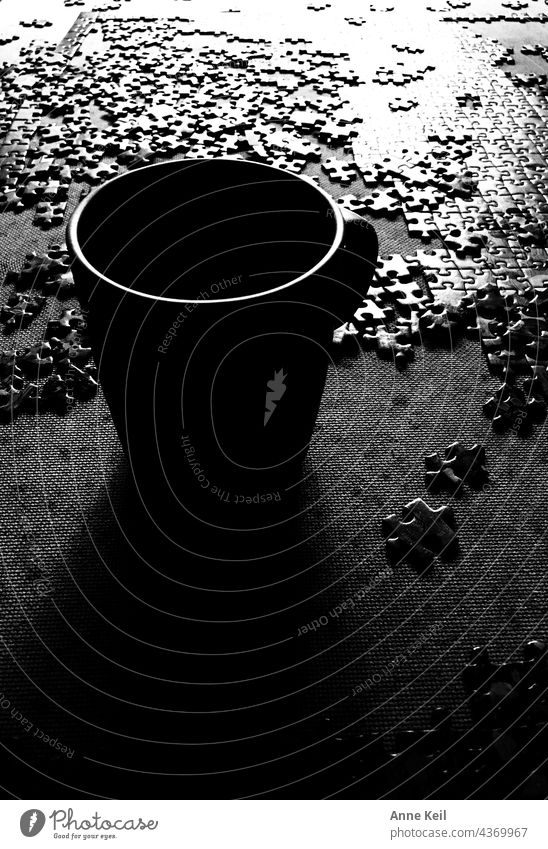 Light and shadow with tea and puzzle Tea Healthy Puzzle Black & white photo Shadow splendour Interior shot Contrast Deserted Copy Space bottom