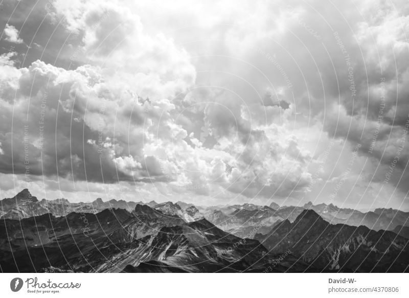 Mountains and clouds Clouds Sky Gigantic huge Panorama (View) Alps Vantage point Far-off places Peak Impressive