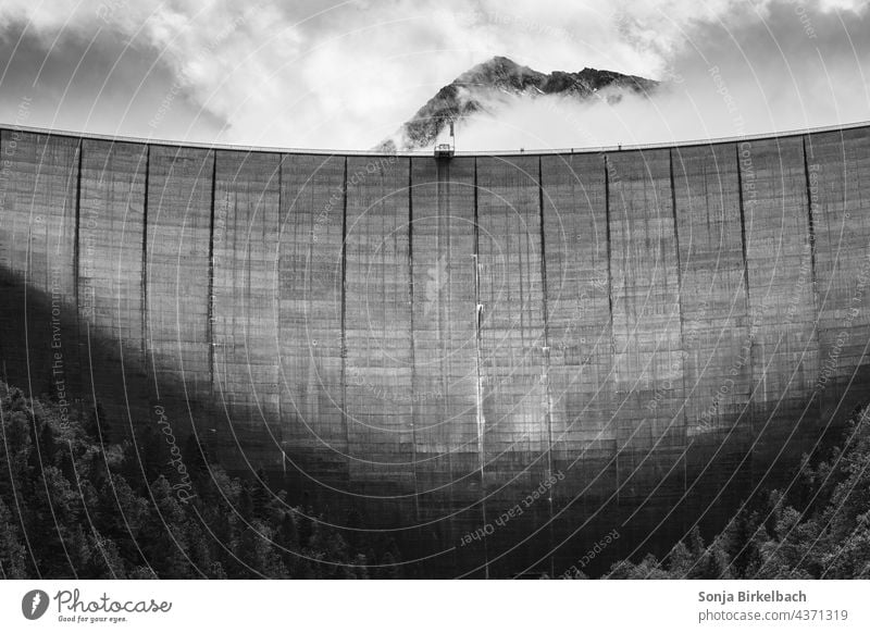 The Wall Wall (barrier) Retaining wall dam Reservoir Storehouse schlegeis Zillertal Alps Austria Europe Tyrol Tall mountains Clouds Dramatic black-and-white