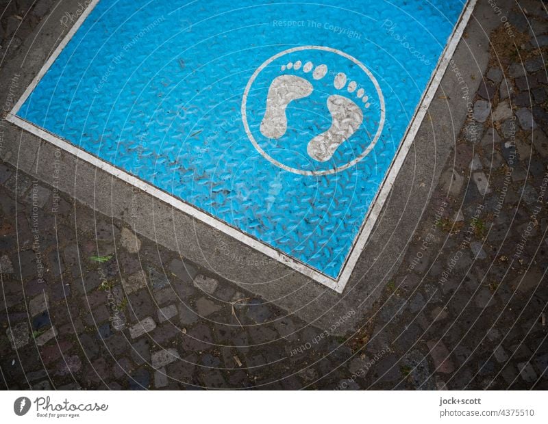Location is right here Illustration Footprint Sign Barefoot Imprint Street art Pictogram Structures and shapes Position Blue Feet Metal Site Surface structure