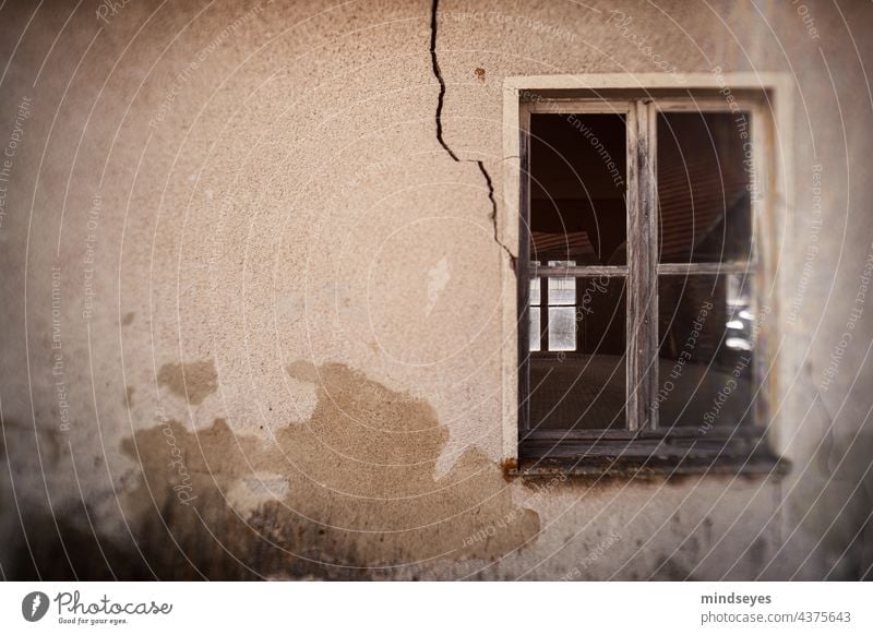Window with crack old house crumbling facade Old Derelict condemned house Transience Ruin Past Change Building Architecture House (Residential Structure) Facade