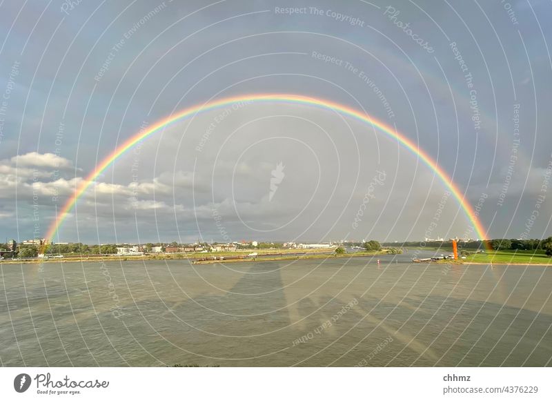 Rainbow over the Ruhr River River bank Rhine Exterior shot Landscape Reflection The Ruhr estuary Mouth of a river Storm Nature Sky Copy Space top shadow cast