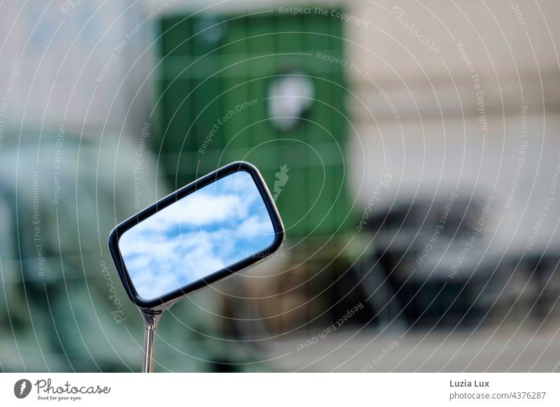 A piece of sky in the mirror of an old motorcycle, in front of blurred backyard Sky Blue Clouds Summer Beautiful weather Motorcycle Mirror Motorcycle mirrors