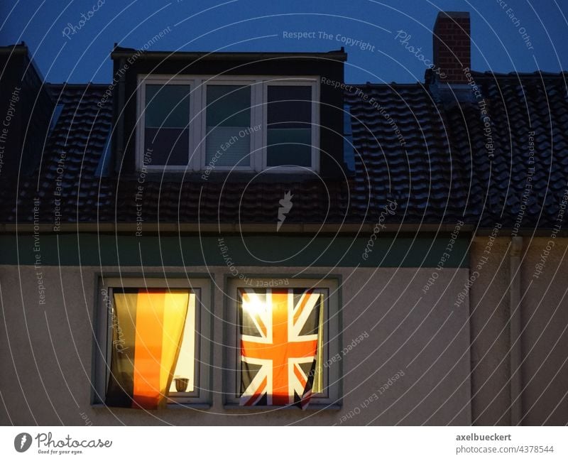 German and English flag next to each other in the window Germany England Flag German Flag english flag black-red-gold Union Jack Side by side Foot ball