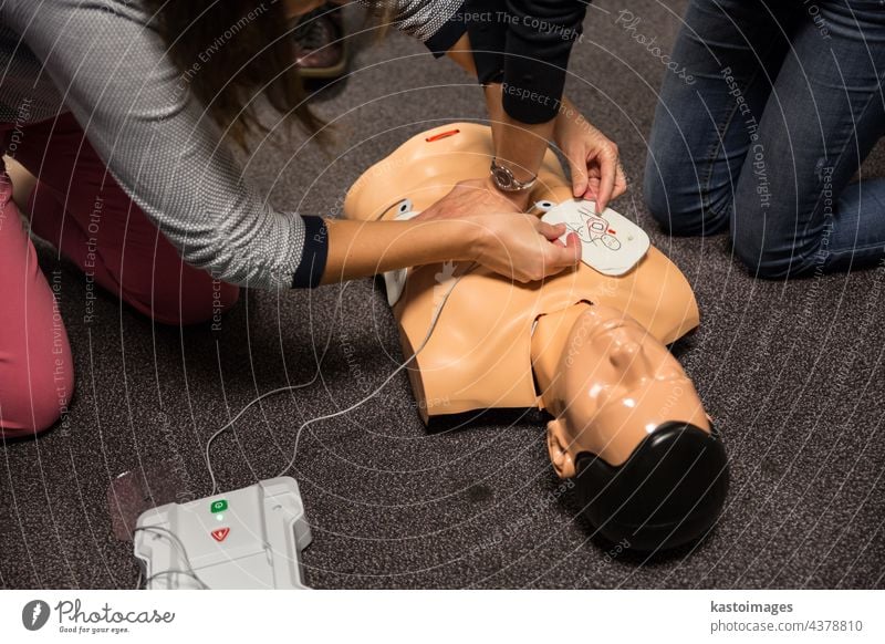 First Aid Training. Defibrillator CPR Practice aid first training workshop defibrillator aed cpr health heart saver arrest attack automated cardiac