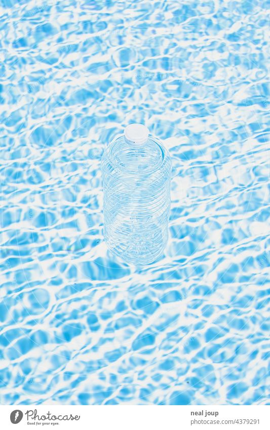 Transparent plastic bottle floats in crystal clear water Water Reflection Light Bright transparency transparent Blue White Summer Sun sunshine chill Refreshment