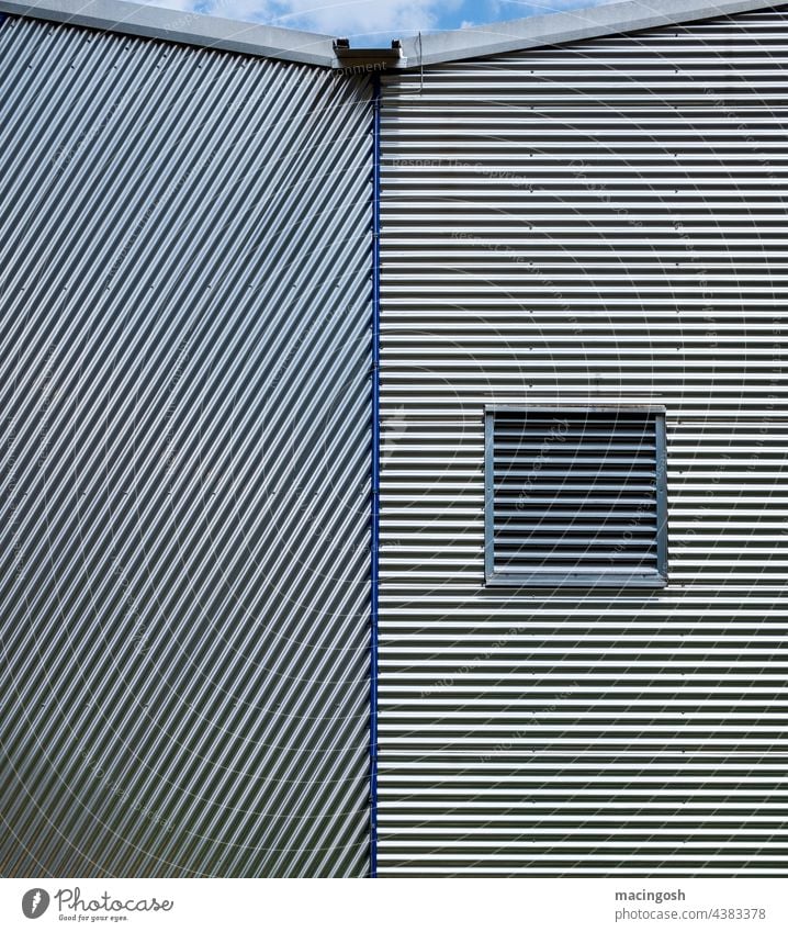 Industrial facade with corrugated sheet metal Industry Metal Deserted Industrial zone Facade Exterior shot Building Industrial plant Factory Architecture