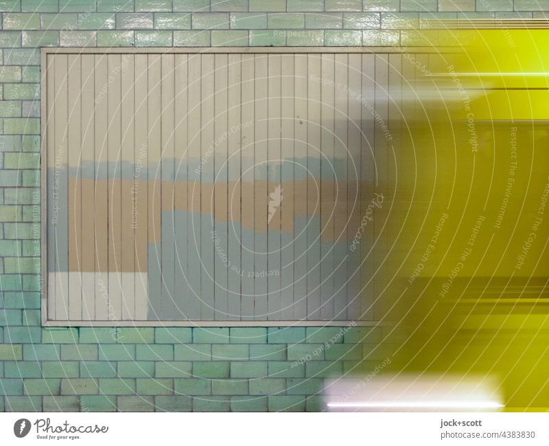 The subway rides in front of the painted billboard Billboard Wall (building) Berlin Alexanderplatz Painted Tile Subsoil Structures and shapes Abstract