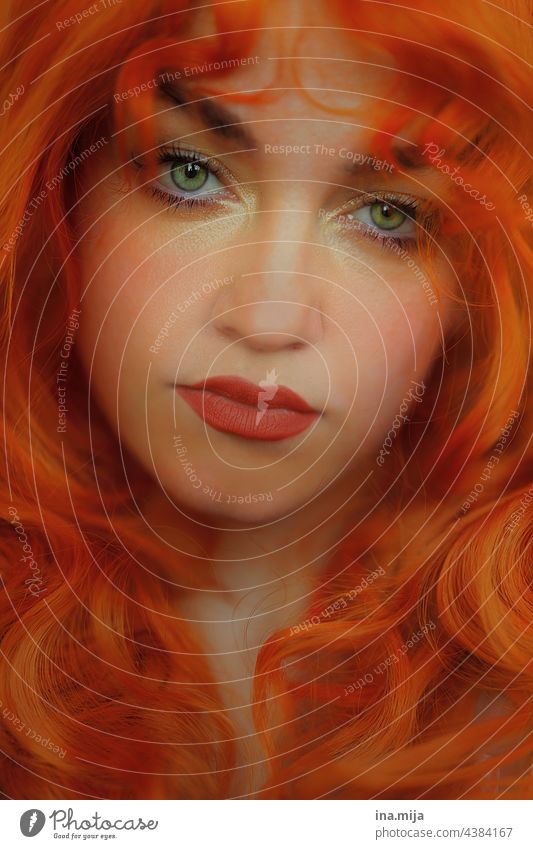Curly hair__portrait of a young woman with orange curly hair and green eyes Orange red Red-haired redhead pretty Fabulous hairstyle Eye colour Green feminine