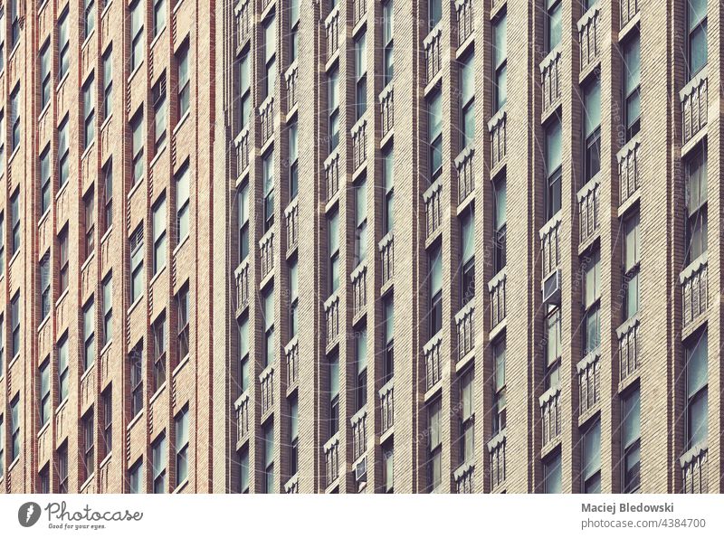 Close up picture of New York City old brick building, color toned urban background, USA. city new york office skyscraper wall manhattan business NYC America