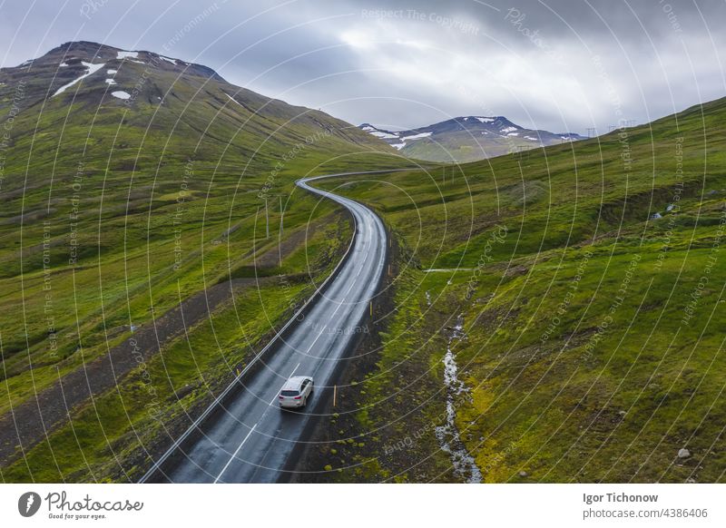 Lonely rental car ride on remote road with beautiful landscape of Iceland Street pretty Car Rent Landscape Icelandic Sky Nature Mountain Blue travel Tourism