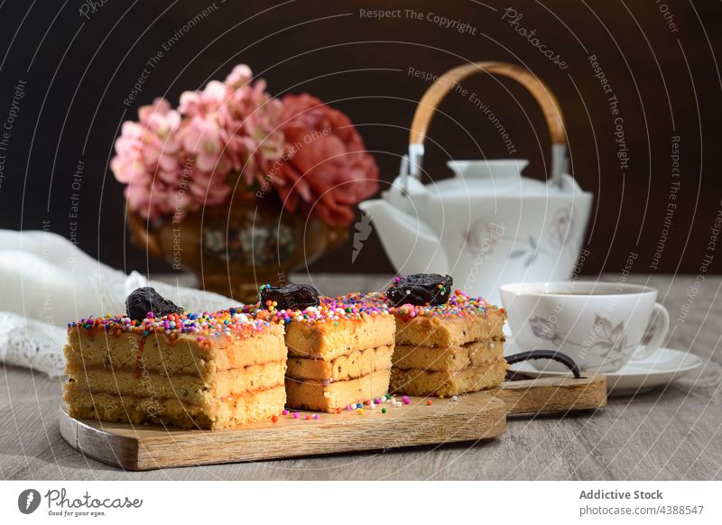 Tasty cake with nougat and prune on plate turron de dona pepa dessert dragee delicious sweet treat serve tasty food tradition cuisine gourmet yummy pastry