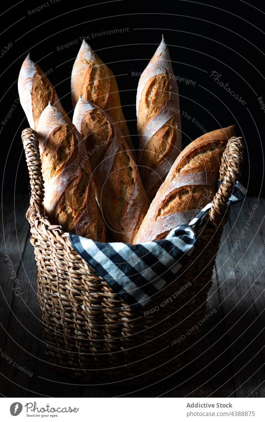 Freshly baked baguettes in basket bread fresh food french wheat healthy bakery grain organic delicious traditional flour rye tasty breakfast natural whole