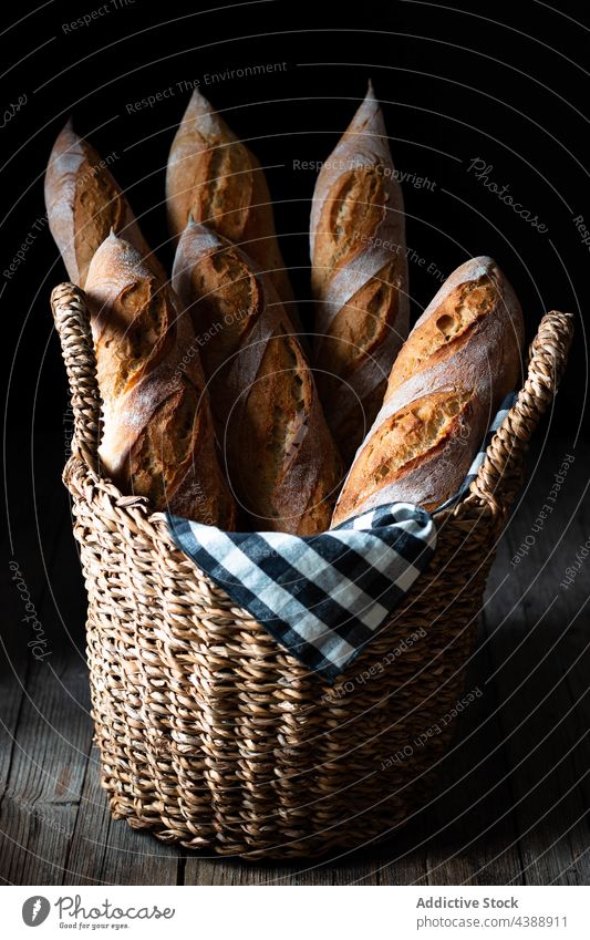 Freshly baked baguettes in basket bread fresh food french wheat healthy bakery grain organic delicious traditional flour rye tasty breakfast natural whole
