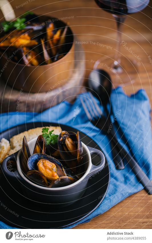Steamed Mussels mussels saucepan herbs cooking kitchen mollusk seafood lunch gourmet dish shellfish meal restaurant clam cuisine delicious tasty yummy water