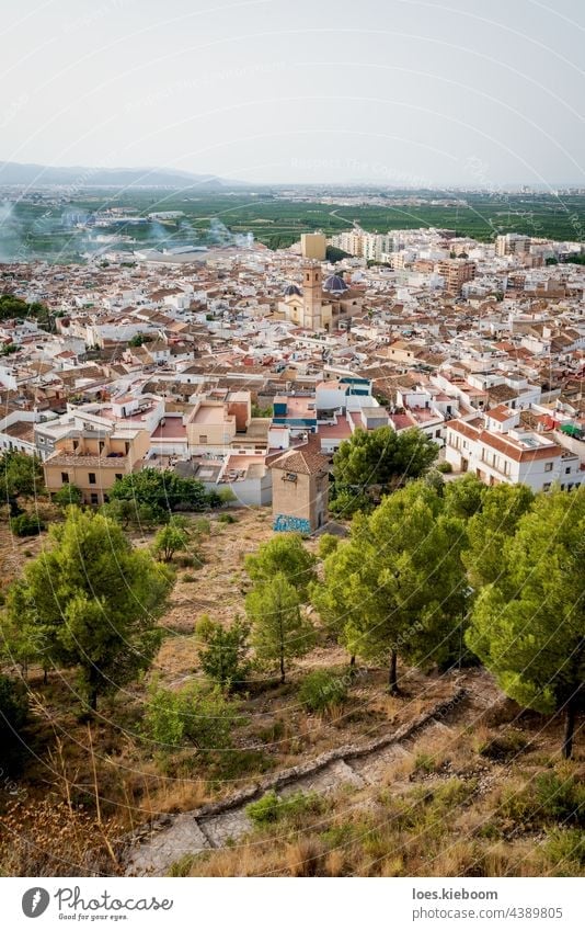 Top view from the castle 'Santa Anna' on the Spanish old town with the church 'San Roque', Oliva, Spain oliva spain landscape architecture sant roc house summer