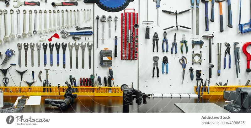 Collection of repair tools on wall workbench kit professional garage storage workshop maintenance service accurate fix organization instrument set equipment
