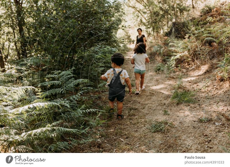 Mother with children hiking Family & Relations Brothers and sisters Exterior shot Happy Colour photo Adults Parents Together Joy Human being Infancy Child