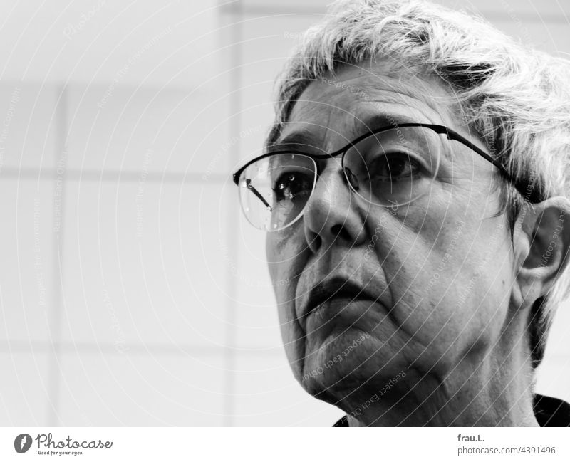 Old woman with water drops on glasses portrait Eyeglasses Face tiles gray hair Amazed Exasperated crease Androgynous Facial expression Head