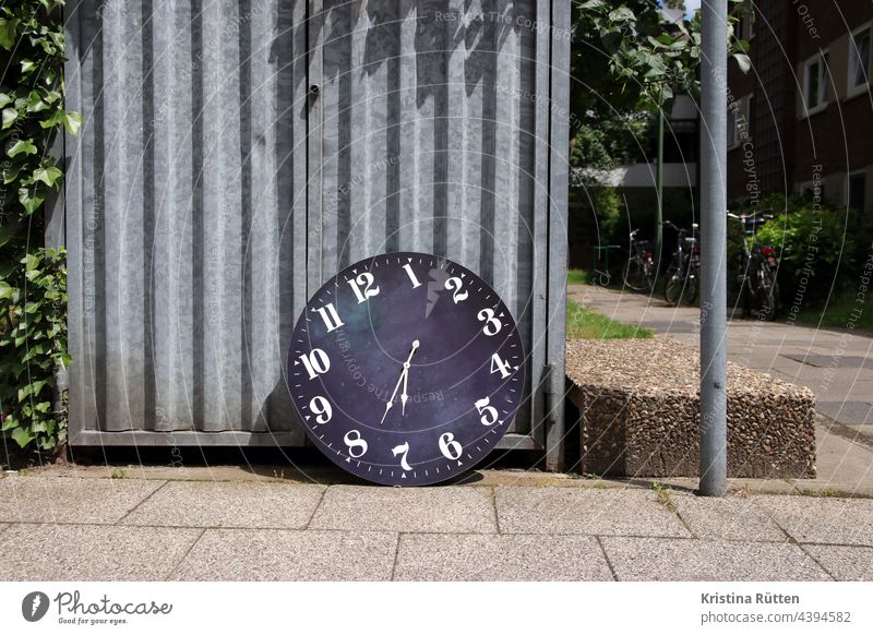 the wasted time Clock Wall clock Clock face clock hands Time Expired Doomed filed turned off Trash Bulk rubbish Dispose of Throw away Street out symbol symbolic
