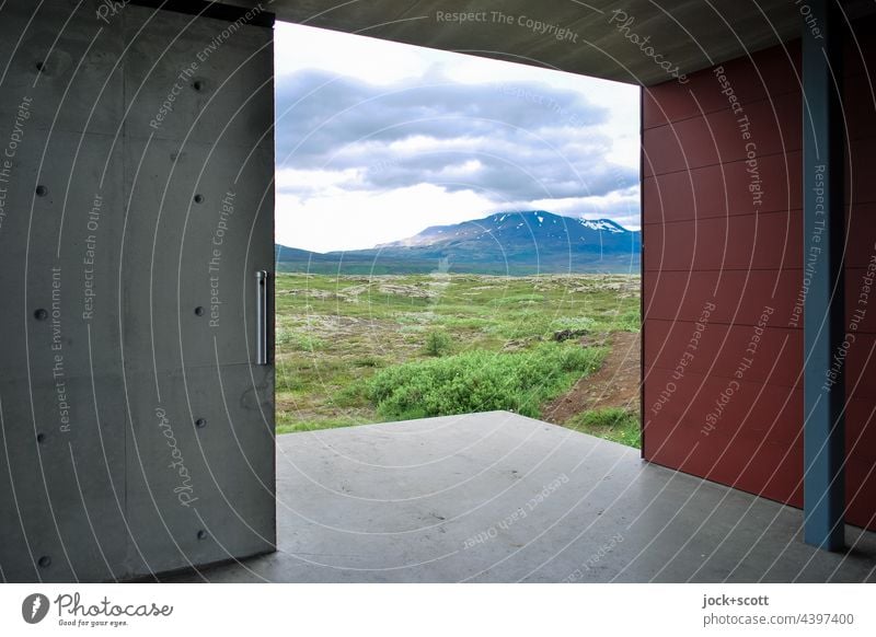 Look out, look across the land Modern architecture Building Goal Sliding gate Landscape Mountain Iceland Clouds Sky Nature Climate Vantage point outlook