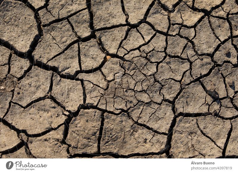 Dry and cracked land, due to lack of rain, near the Torreblanca, Spain. Effects of climate change such as desertification and droughts Prat de Cabanes