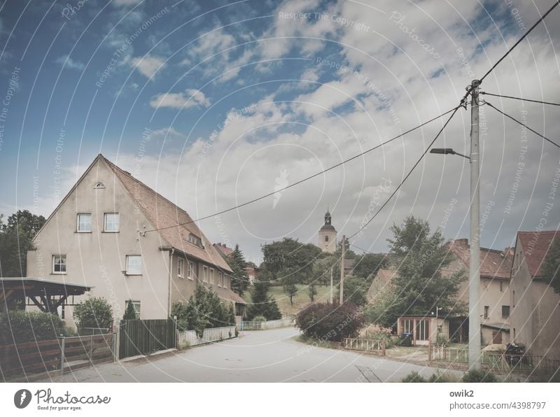 nothing going on Village road tranquillity Idyll Eastern Germany Village idyll House (Residential Structure) Building Asphalt Day Detail Modest Right ahead