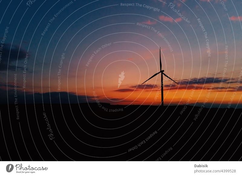 Windmill silhouette at sunset sky. energy wind generator turbine windmill technology warming propeller sustainable landscape eco electric concept industry power