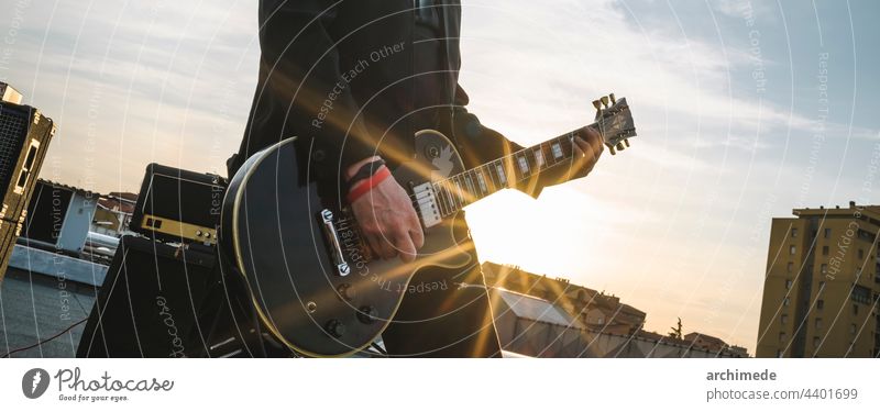 Guitarist playing outdoors guitar concert live music musician electric guitar guitarist event stage attitude rock and roll entertainment fun people lifestyle