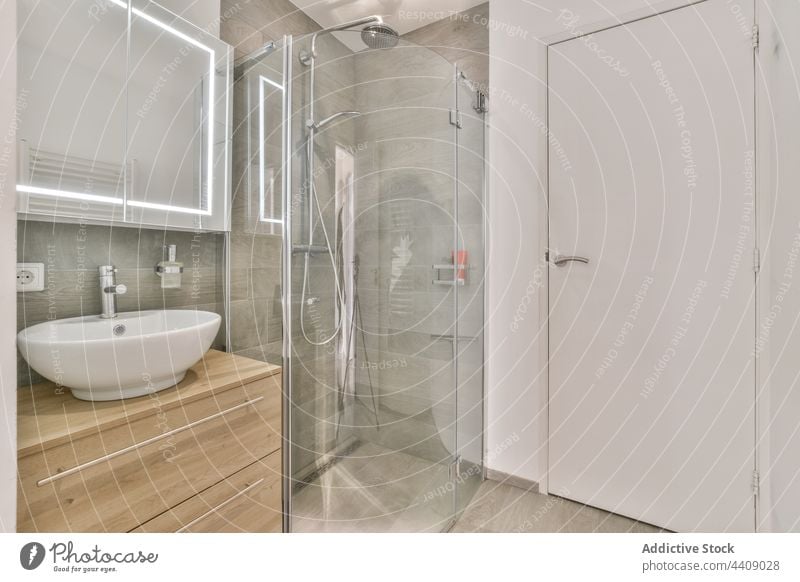 White bathroom interior design in luxury house white style home modern washroom residential washbasin sink cabinet wooden partition glass shower apartment
